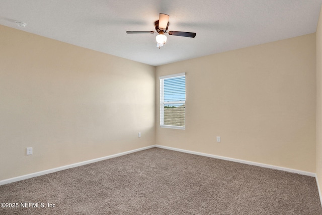 2351 Oak Stream Dr, Green Cove Springs, FL 32043 - carpeted empty room with baseboards and a ceiling fan