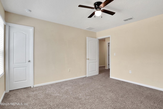 2351 Oak Stream Dr, Green Cove Springs, FL 32043 - unfurnished bedroom with visible vents, baseboards, ceiling fan, and carpet