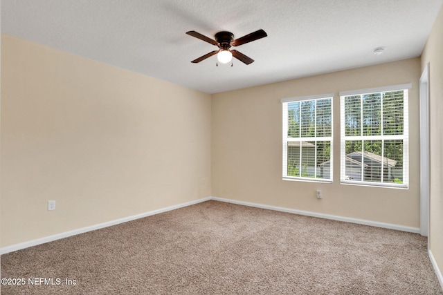 2351 Oak Stream Dr, Green Cove Springs, FL 32043 - carpeted spare room featuring baseboards, a textured ceiling, and ceiling fan