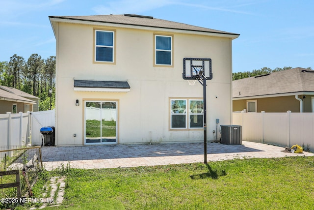 2351 Oak Stream Dr, Green Cove Springs, FL 32043 - back of house with a patio area, fence, a yard, and stucco siding