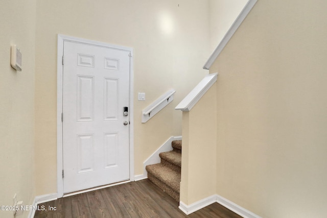 2351 Oak Stream Dr, Green Cove Springs, FL 32043 - entrance foyer featuring dark wood-style flooring, baseboards, and stairs