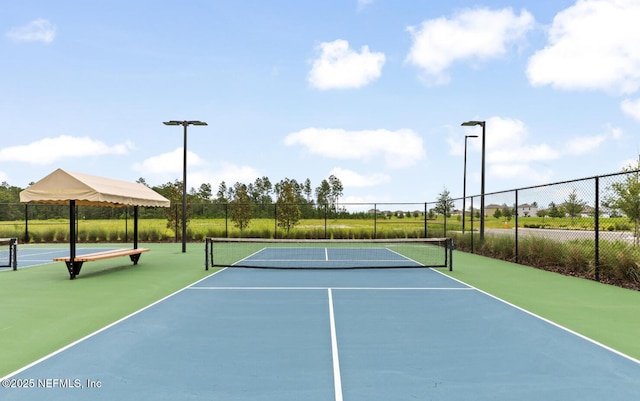 2351 Oak Stream Dr, Green Cove Springs, FL 32043 - view of tennis court with fence