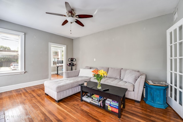 2649 Dellwood Ave, Jacksonville, FL 32204 - living area with baseboards, a ceiling fan, and hardwood / wood-style flooring
