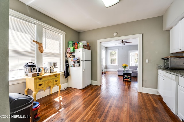 2649 Dellwood Ave, Jacksonville, FL 32204 - kitchen featuring white cabinets, baseboards, a ceiling fan, white appliances, and dark wood finished floors