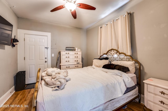 2649 Dellwood Ave, Jacksonville, FL 32204 - bedroom featuring wood finished floors, ceiling fan, and baseboards