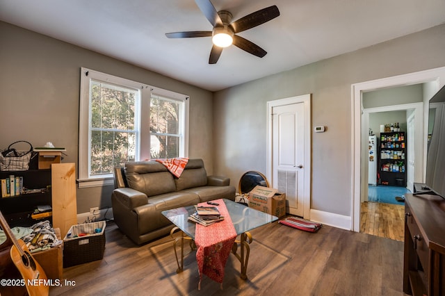 2649 Dellwood Ave, Jacksonville, FL 32204 - living room featuring wood finished floors, ceiling fan, and baseboards
