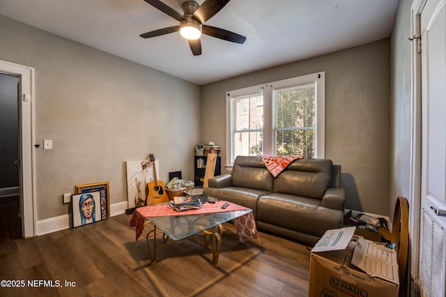 2649 Dellwood Ave, Jacksonville, FL 32204 - living area featuring baseboards, a ceiling fan, and wood finished floors