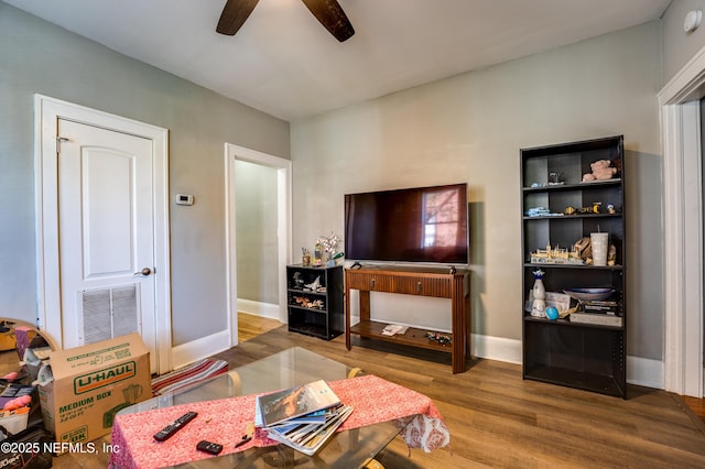 2649 Dellwood Ave, Jacksonville, FL 32204 - living room with wood finished floors, baseboards, a ceiling fan, and visible vents