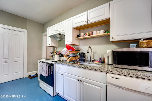 2649 Dellwood Ave, Jacksonville, FL 32204 - kitchen featuring white cabinetry, under cabinet range hood, a sink, and white appliances