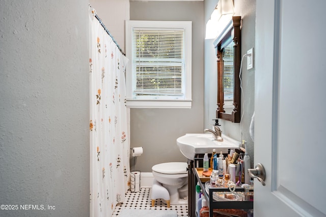 2649 Dellwood Ave, Jacksonville, FL 32204 - full bath with a sink, toilet, and a shower with curtain