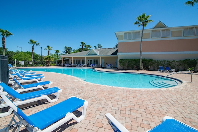 8235 Lobster Bay Ct Unit 305, Jacksonville, FL 32256 - pool featuring a patio area and fence
