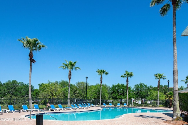 8235 Lobster Bay Ct Unit 305, Jacksonville, FL 32256 - community pool with a patio and fence