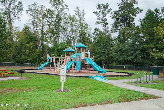 8235 Lobster Bay Ct Unit 305, Jacksonville, FL 32256 - community playground with fence and a lawn