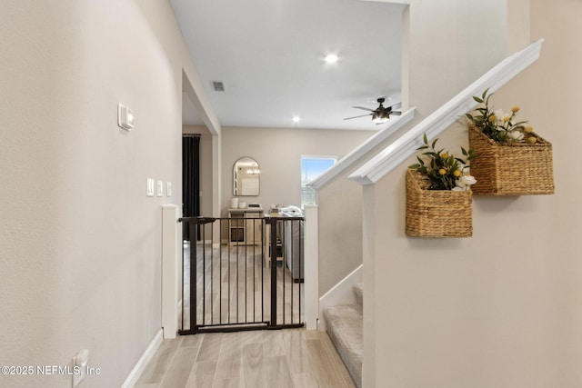 75743 Spoonbill Ln, Yulee, FL 32097 - interior space with wood finished floors, baseboards, visible vents, and stairs