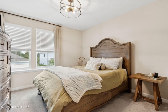 75743 Spoonbill Ln, Yulee, FL 32097 - bedroom featuring baseboards and light carpet