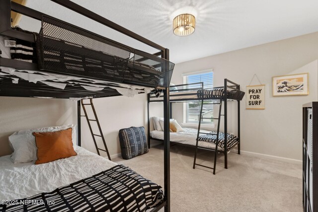 75743 Spoonbill Ln, Yulee, FL 32097 - carpeted bedroom with baseboards