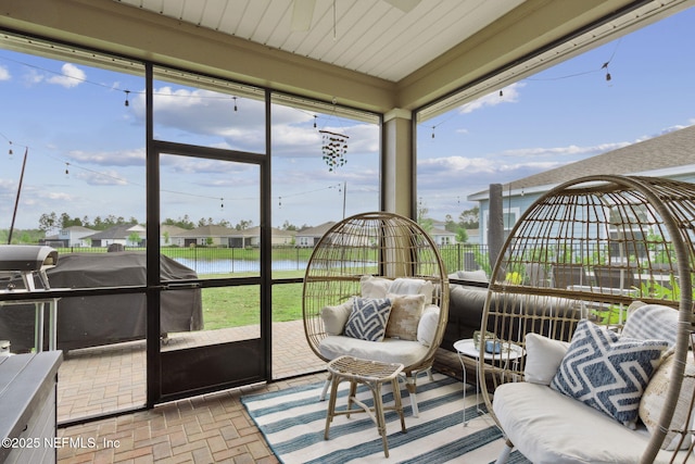 75743 Spoonbill Ln, Yulee, FL 32097 - sunroom / solarium with a water view, plenty of natural light, and a ceiling fan