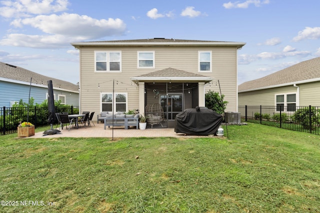 75743 Spoonbill Ln, Yulee, FL 32097 - back of house featuring a yard, a fenced backyard, central AC unit, and a patio