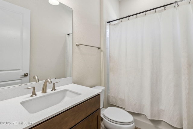 full bath with toilet, shower / tub combo with curtain, and vanity