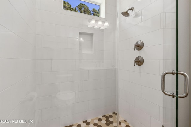 full bathroom with a stall shower