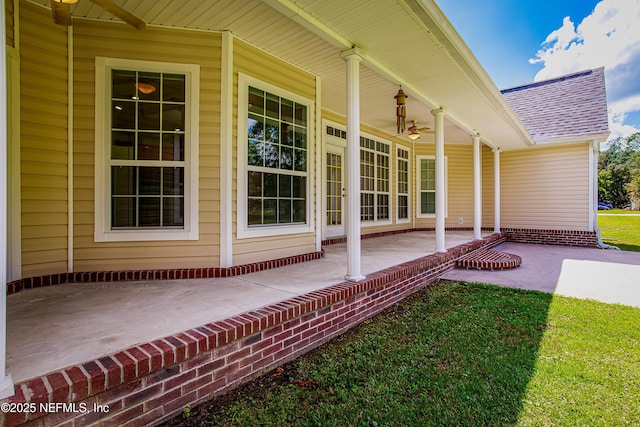 exterior space featuring ceiling fan