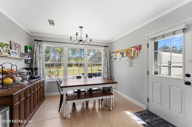12531 County Road 121, Bryceville, FL 32009 - dining area featuring a chandelier, a textured ceiling, baseboards, and visible vents