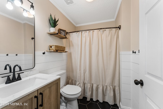 12531 County Road 121, Bryceville, FL 32009 - full bathroom with ornamental molding, toilet, and a textured ceiling