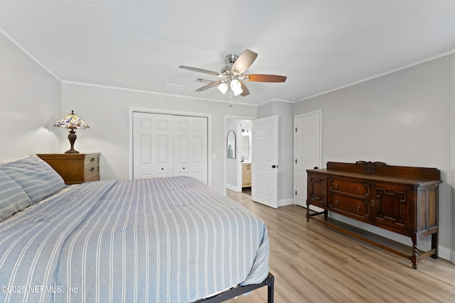 12531 County Road 121, Bryceville, FL 32009 - bedroom with crown molding, light wood-style flooring, ceiling fan, and baseboards