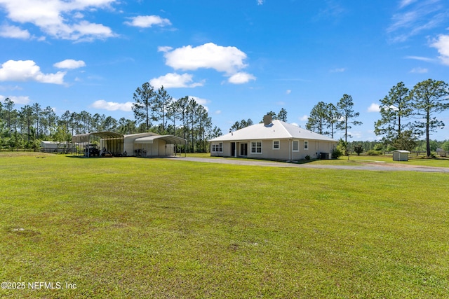 12531 County Road 121, Bryceville, FL 32009 - view of yard featuring driveway and a detached carport
