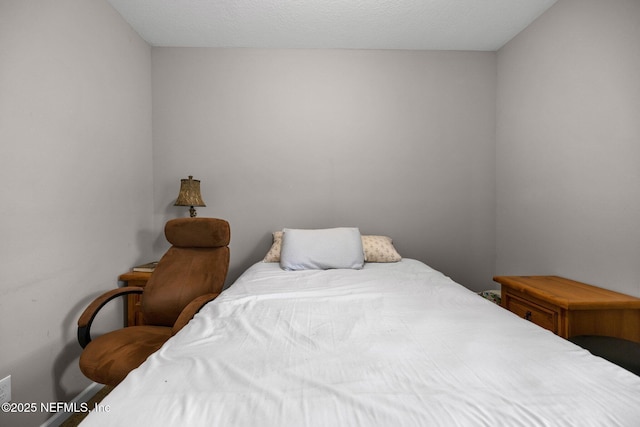 bedroom with baseboards