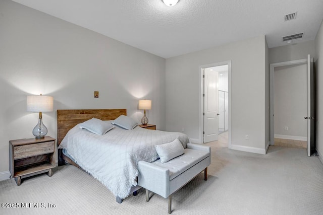 145 Bridgeton St, Saint Johns, FL 32259 - bedroom featuring a textured ceiling, light colored carpet, baseboards, and visible vents
