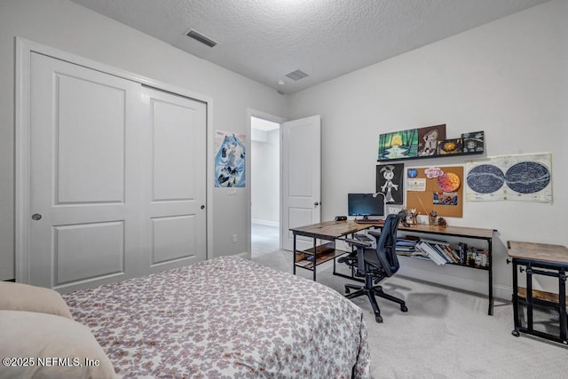 145 Bridgeton St, Saint Johns, FL 32259 - carpeted bedroom featuring visible vents, baseboards, a closet, and a textured ceiling