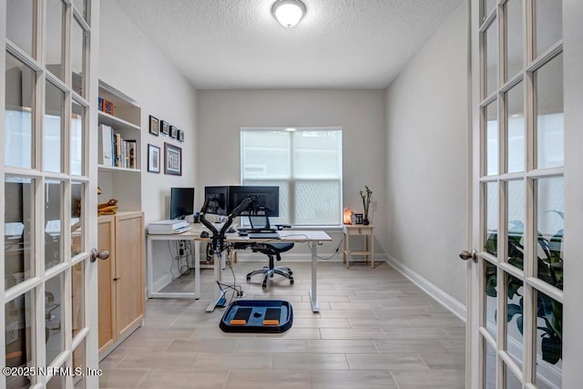 145 Bridgeton St, Saint Johns, FL 32259 - office with french doors, a textured ceiling, and baseboards