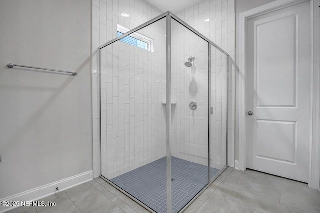 145 Bridgeton St, Saint Johns, FL 32259 - bathroom with a shower stall, baseboards, and tile patterned flooring
