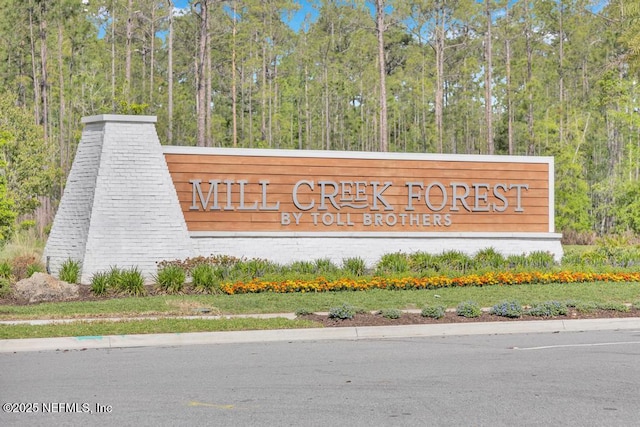 145 Bridgeton St, Saint Johns, FL 32259 - community sign featuring a wooded view