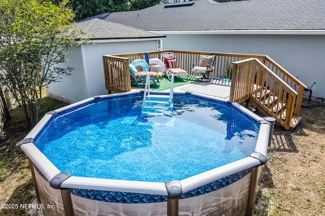 view of pool with a deck