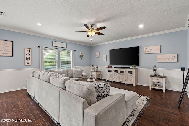 112 Bluffton Ct, Saint Augustine, FL 32092 - living area featuring a wainscoted wall, a textured ceiling, a ceiling fan, wood finished floors, and crown molding