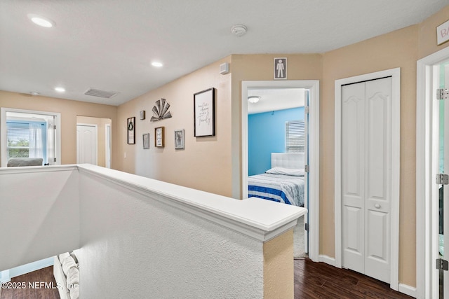 112 Bluffton Ct, Saint Augustine, FL 32092 - corridor with baseboards, visible vents, recessed lighting, and dark wood-style flooring