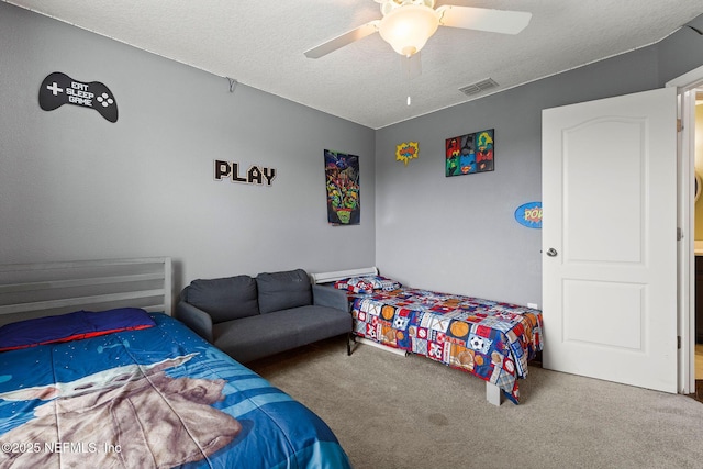 112 Bluffton Ct, Saint Augustine, FL 32092 - bedroom with a textured ceiling, carpet floors, visible vents, and a ceiling fan