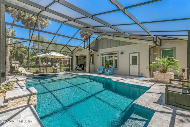 355 Lambert Ave, Flagler Beach, FL 32136 - outdoor pool with glass enclosure and a patio