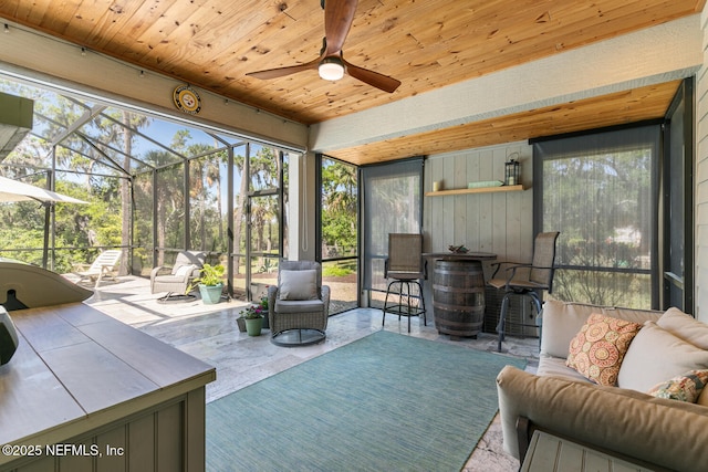 355 Lambert Ave, Flagler Beach, FL 32136 - sunroom featuring ceiling fan, an outdoor living space, and a healthy amount of sunlight