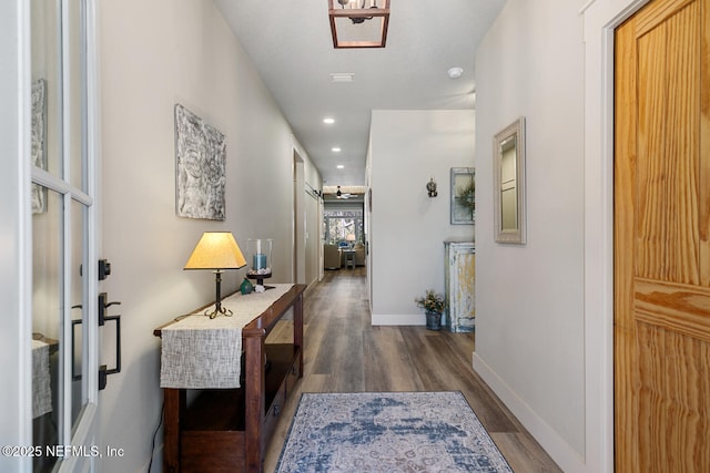355 Lambert Ave, Flagler Beach, FL 32136 - hall featuring wood finished floors, baseboards, and recessed lighting
