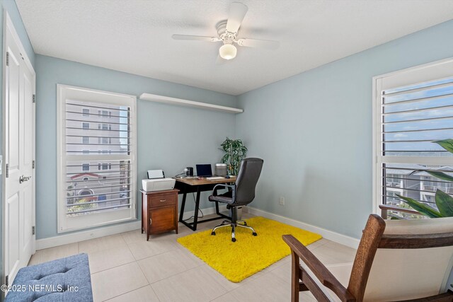 275 1st St S Unit 504, Jacksonville Beach, FL 32250 - office featuring baseboards, a ceiling fan, and light tile patterned floors