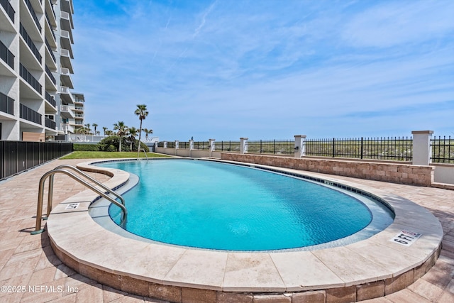 275 1st St S Unit 504, Jacksonville Beach, FL 32250 - community pool with fence and a patio area