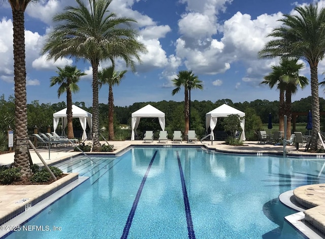 114 Fremont Ave, Saint Augustine, FL 32095 - community pool with a gazebo and a patio
