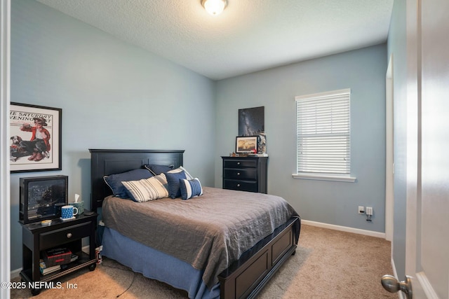 114 Fremont Ave, Saint Augustine, FL 32095 - bedroom featuring light colored carpet, baseboards, and a textured ceiling