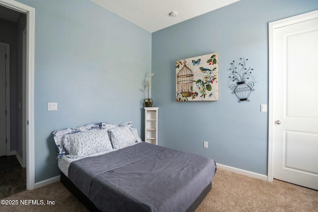 114 Fremont Ave, Saint Augustine, FL 32095 - carpeted bedroom featuring baseboards