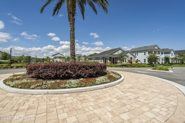 114 Fremont Ave, Saint Augustine, FL 32095 - surrounding community featuring curved driveway and a residential view