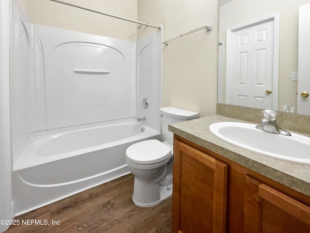 1825 Lago Del Sur Dr, Middleburg, FL 32068 - full bath with toilet, wood finished floors, vanity, and shower / bathtub combination