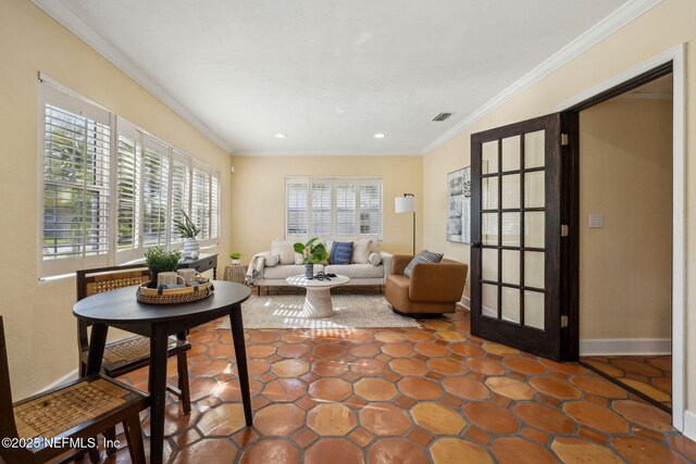 living room with crown molding, baseboards, recessed lighting, and visible vents